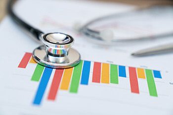 Financial report chart and calculator Medical Report and stethoscope